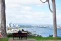 Australian old men and senior women travel and sit relax on bench in garden at Pe