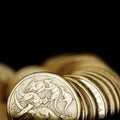 Australian One Dollar Coins over Black Royalty Free Stock Photo