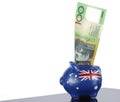 Australian one hundred dollar note in piggy bank Royalty Free Stock Photo