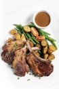 Australian organic lamb chops with gravy meal on white backgroundv