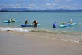 Australian people learn how to use kayak in Byron Bay beach New South Wales Australia Royalty Free Stock Photo