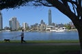 Australian person walking a dog along Nerang River in Surfers Paradise Gold Coast Queensland Australia Royalty Free Stock Photo