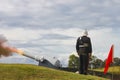 Australian reenactment soldier standing at attention was cannon is fired