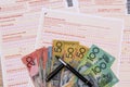 Australian tax form with pen and australian dollars on it. Taxation company
