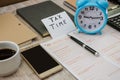 Australian tax forms, calculator, notebooks and pen on the table.