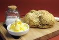 Australian traditional damper bread with butter curls Royalty Free Stock Photo