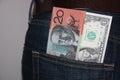 Australian and US dollars in jeans pocket Royalty Free Stock Photo
