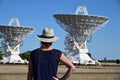 Australian woman looking at the Telescope Compact Array near Narrabri NSW Australia Royalty Free Stock Photo