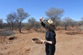 Australian woman searching gem stones in Australia outback Royalty Free Stock Photo