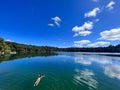 Australian woman swim in Lake Eacham Queensland Australia