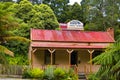 Australian wooden minerâs cottage with corrugated metal roof