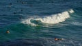 Australian young man and lady surfing at Tamarama beach in Sydne