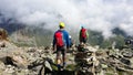 Austria. Alpine region `Stubai`. Climbers on a mountain path.
