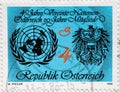 AUSTRIA - CIRCA 1985: a postage stamp printed in the Austria showing the emblem of the United Nations and the Austrian heraldic an