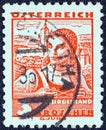 AUSTRIA - CIRCA 1934: A stamp printed in Austria from the `Costumes` issue shows a woman from Burgenland, circa 1934.