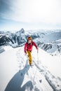 Austria, December 26 2018. Ski touring man in high alpine landscape with snowy trees