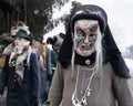 AUSTRIA, GASTEIN - January 1, 2023: old witch in the perchtenlauf procession in the austrian Gastein valley