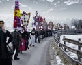 AUSTRIA, GASTEIN - January 1, 2023: perchten dancing on a country road in the Austrian Gastein Valley