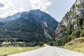 Austria - July, 2019: Asphalt road in Austria, Alps in a beautiful summer day Royalty Free Stock Photo