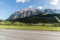 Austria - July, 2019: Asphalt road in Austria, Alps in a beautiful summer day Royalty Free Stock Photo