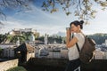 Austria. Salzburg. A young tourist girl takes pictures Royalty Free Stock Photo