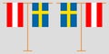 The Austrian and Swedish vertical flags Royalty Free Stock Photo