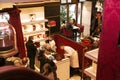 Austria, Vienna- February 18, 2014 : Entrance to the Hotel Sacher cafe. Selling desserts in a cafe