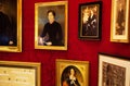 Austria, Vienna- February 18, 2014 : Hotel Sacher cafe. A lot of pictures on the wall