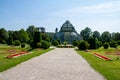 Austria, Vienna, Schonbrunn The Palm House, red flowers in the flowerbed