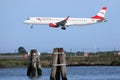 Austrian Airlines plane landing on Venice Marco Polo Airport, VCE