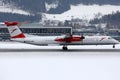 Austrian Airlines plane taxiing on Innsbruck Airport, INN Royalty Free Stock Photo