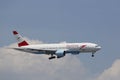 Austrian Airlines Boeing 777 on approach to JFK International Airport in New York Royalty Free Stock Photo