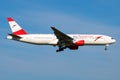 Austrian Airlines Boeing 777-200 OE-LPD passenger plane arrival and landing at Vienna Airport Royalty Free Stock Photo