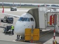 Austrian Airlines Embraer ERJ-195LR boarding in Vilnius Royalty Free Stock Photo