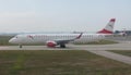 Austrian Airlines Embraer ERJ-195LR taxiing in Vienna Royalty Free Stock Photo