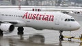 Austrian Airlines plane in Innsbruck airport, INN Royalty Free Stock Photo