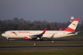 Austrian Airlines plane taxiing on runway in Vienna Airport, VIE Royalty Free Stock Photo