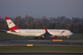 Austrian Airlines plane taxiing on runway in Vienna Airport, VIE Royalty Free Stock Photo