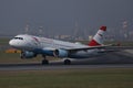 Austrian Airlines plane taking off from runway in Vienna Airport, VIE Royalty Free Stock Photo