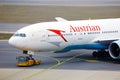 Austrian Airlines plane being towed