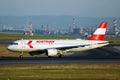 Austrian Airlines plane doing taxi on taxiway, new livery