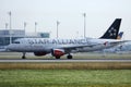 Austrian Airlines Star Alliance plane taking off from runway Royalty Free Stock Photo