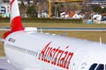 Austrian Airlines plane at Innsbruck Airport, INN, closeup Royalty Free Stock Photo