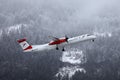 Austrian Airlines plane taking off from Innsbruck Airport Royalty Free Stock Photo