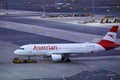 Austrian Airlines plane taxiing, night view Royalty Free Stock Photo