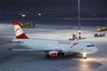 Austrian Airlines plane taxiing, night view Royalty Free Stock Photo