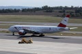 Austrian Airlines plane taxiing on runway in Vienna Airport, VIE Royalty Free Stock Photo