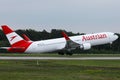 Austrian Airlines plane doing taxi on taxiway Royalty Free Stock Photo