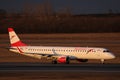 Austrian Airlines small jet taxiing on taxiway Royalty Free Stock Photo