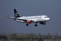 Austrian Airlines Star Alliance plane landing in airport Royalty Free Stock Photo